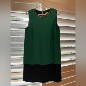 Satin emerald green and black dress, knee length with jeweled neckline